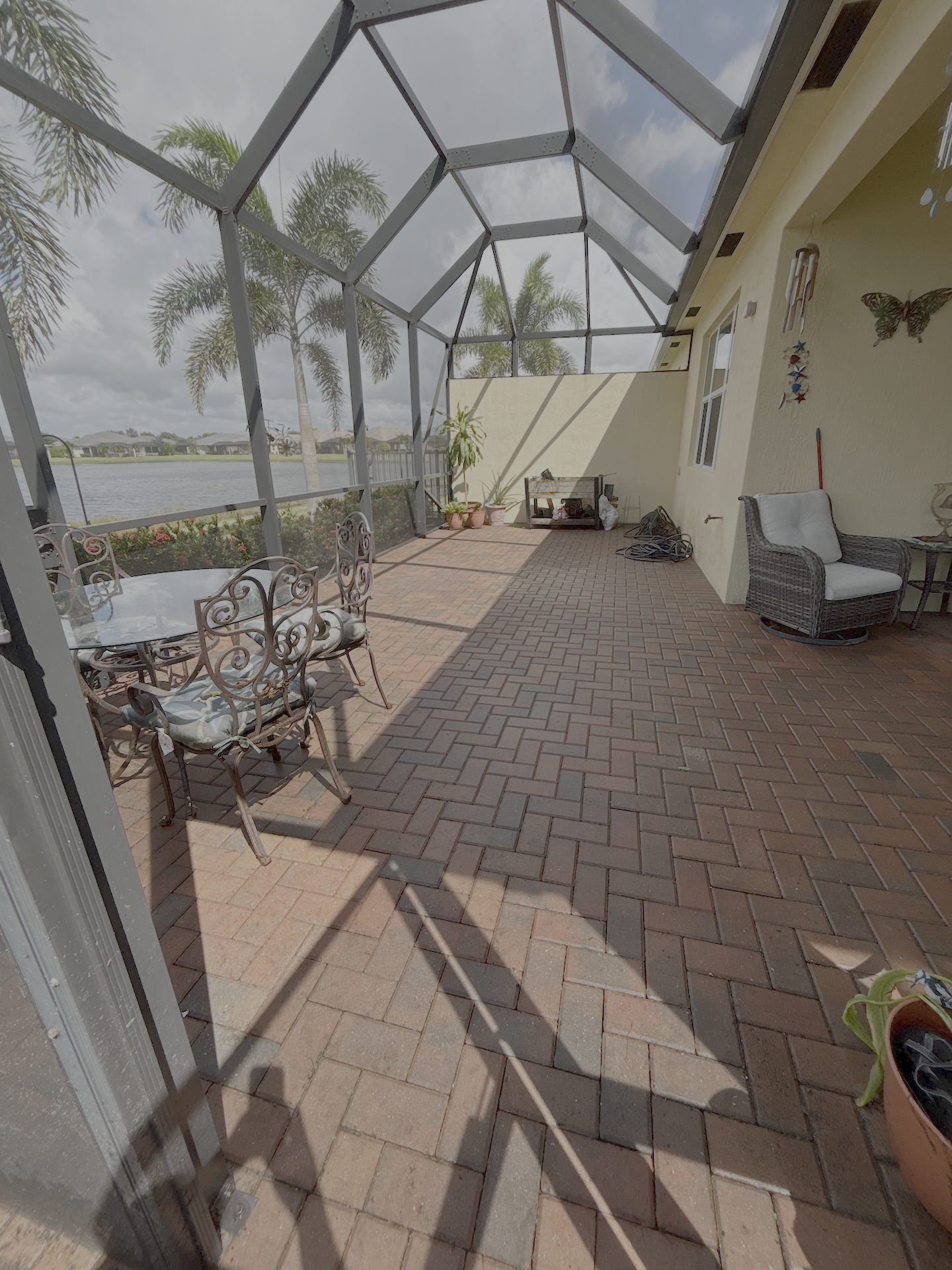 Lanai cleanup. Overgrown with algea; yet cleaned up nice!